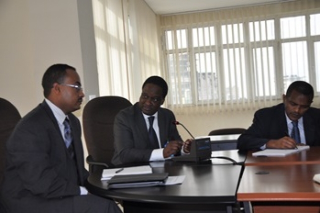 l-r: Dr. Kesetebirhan Admasu, Dr. Pierre M’Pele, Dr. Kebede Worku, as Dr. M’Pele speaks at the WHO DTA welcoming ceremony, MoH, 19 August 2013.