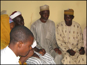 Participants in a town hall meeting discuss immunization in their community.