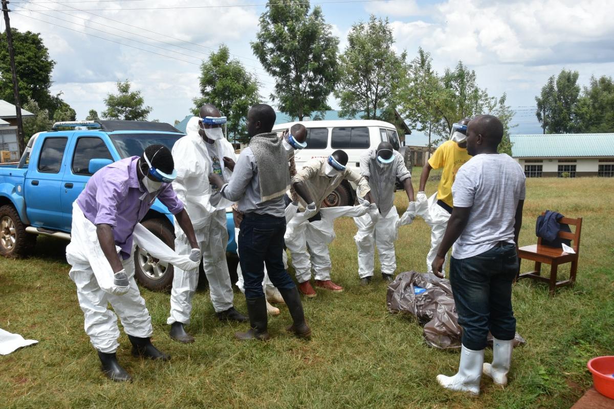 Health workers don their Personal protective Equipment 