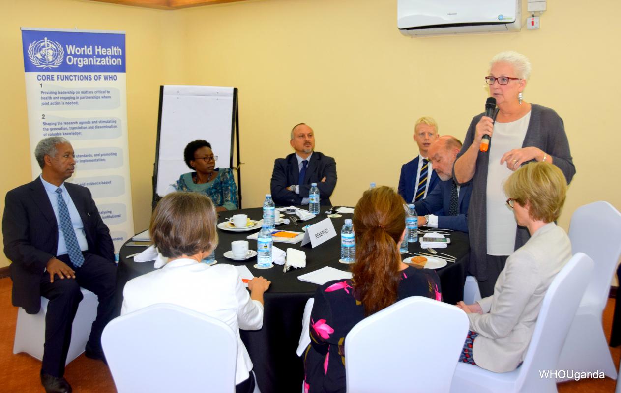 US Ambassador Ms Deborah R. Malac shares her experience from the visit to Uganda-DRC border, surrounding her are the members of the Diplomatic Corps, the Minister of Health and the WHO Representative 