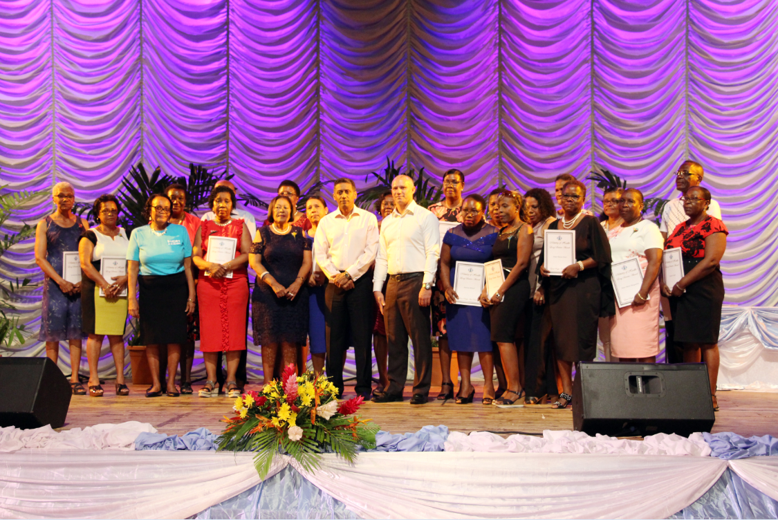 President Danny Faure and Health Minister Jean Paul Adam with health staff with 40 years’ service