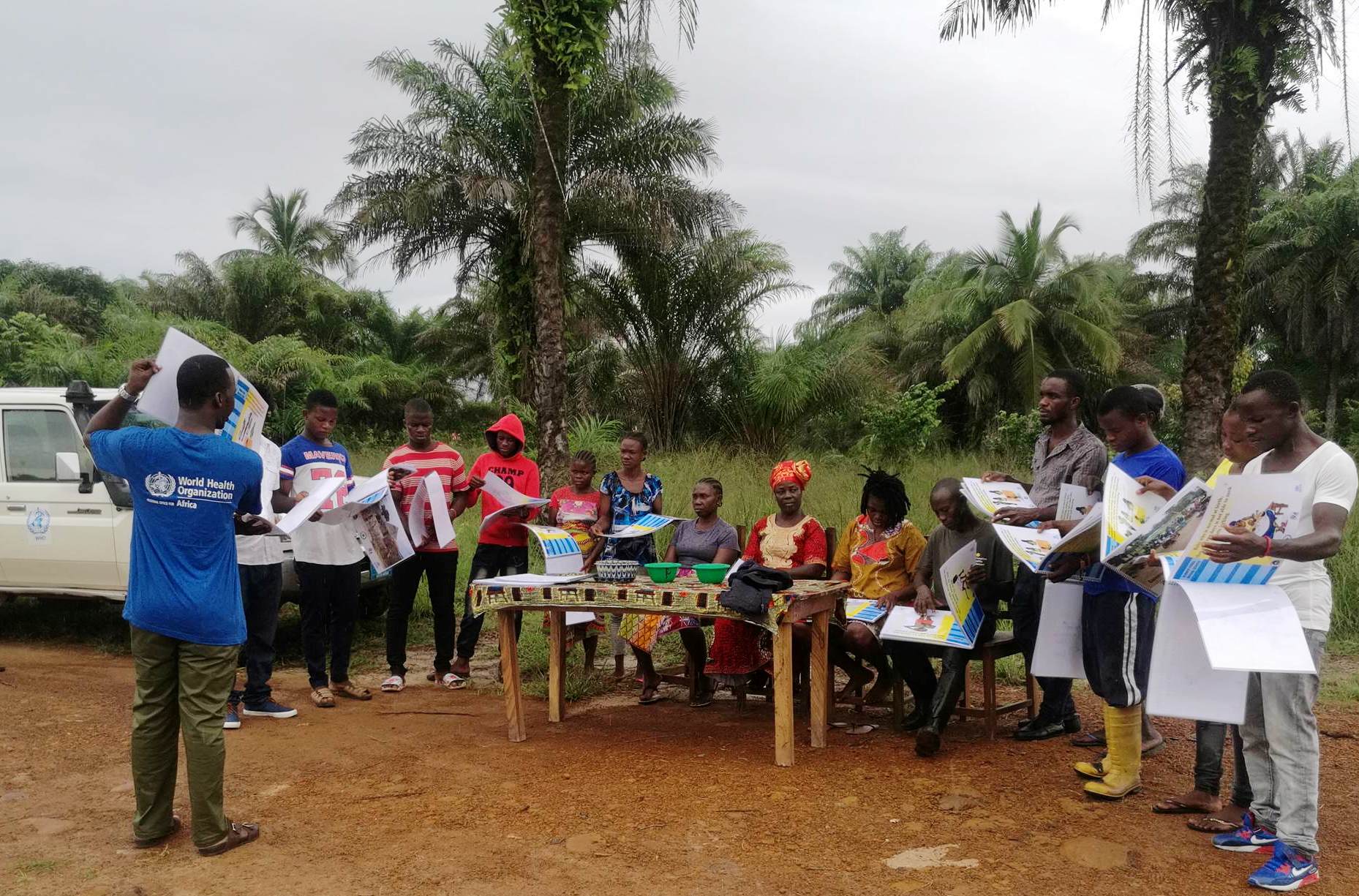 A WHO Epidemiologist sensitizing community health volunteers on the IDSR priority disease and conditions