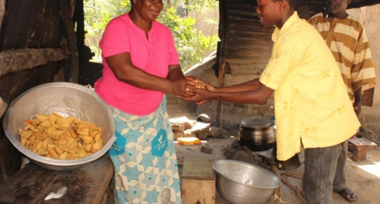 Madam Kamazoue Abatan, food vendor. She is a beneficiary of early diagnosis and prompt treatment.