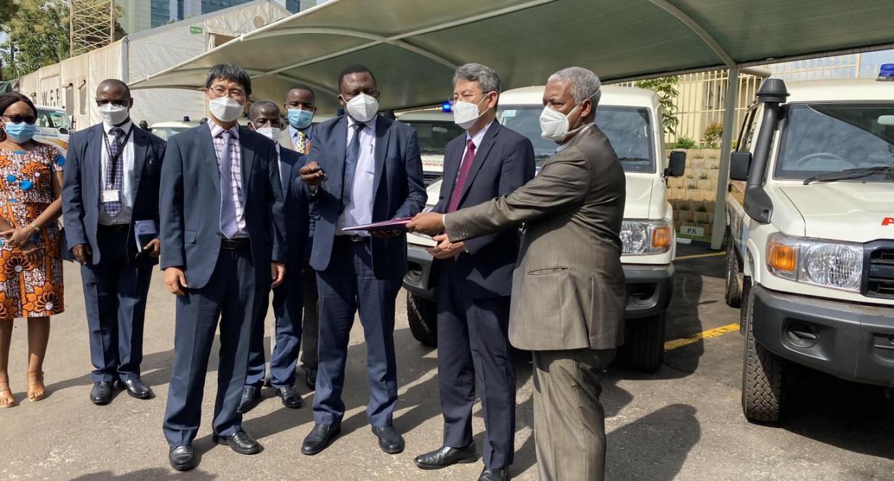 Ministry of Health Director of Clinical Services, Dr. Charles Olaro officially receives the ambulances from the Ambassador of Korea to Uganda H.E Ha Byung-Kyoo and WHO Representative in Uganda Dr Yonas Tegegn Woldemariam