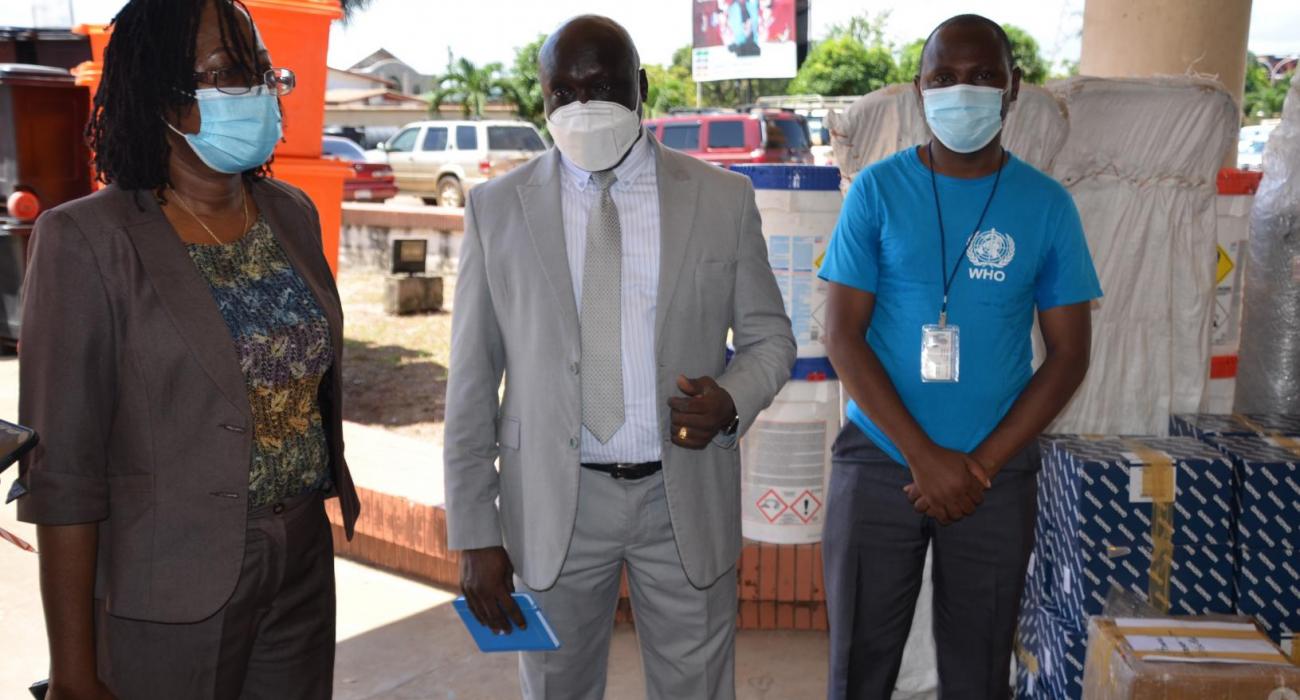 Health Min. Dr. Jallah, WHO Country Rep. Dr. Clement and WHE Cluster Lead Dr. Monday during the donation ceremony in Monrovia