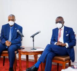 Lagos State Governor (right) listening to the WHO Representative at the Government House.