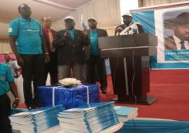 The President of the Republic of South Sudan, Gen Salva Kiir launching the National Malaria Strategic Plan, 2014 to 2021. Next to the President is the Minister of cabinet affairs, Hon Martin; Holding the Malaria Strategic Plan (Center) is the Minister of Health, Dr Reik Gai Kok, Left is the Under Secretary Dr Makur Matur and behind is the WHO South Sudan Country Representative Dr Abdi Aden Mohamed.