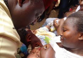 HE Governor Rochas Okorocha of Imo State vaccinating a child