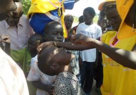 A child getting vaccine in the special vaccination post in Unity