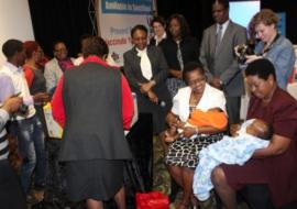 The UNICEF Country Representative, Ms Rachel Odede and the Deputy Director Health Services– Mrs Rejoice Nkambule hold babies ready to receive the inaugural PCV 13 doses while WHO Country Representative , Dr Owen Kaluwa and other Officials look on.