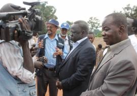 Dr Abdi, Dr Riek Gai Kok and State Minster of Health addressing a team of journalists at the Gangura border entry point, Western Equatoria State.