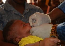 A child receiving Vitamin A supplementation during the campaign