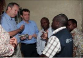 WHO Field Coordinator briefing the UN team in Kailahun.