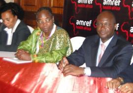 Kenya’s WHO country Representative Dr Custodia Mandlhate (in green) with Health Secretary Mr James Macharia at the 3-day Africa Health Conference which opened in Nairobi, November 24, 2014. The conference called for African-based solutions to health challenges.