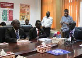 Minister of Health, Dr. Riek Gai Kok addressing the press conference on cholera in Juba, alongside tate Minister of Health for Central Equatoria State, Hon. Dr. Felix Ladu and WHO Country Representative Dr. Tarande Manzila.