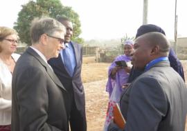 Dr Idowu (right) explaining the rationale for environmental surveillance to Mr Gates while Alhaji Dangote listened