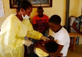 Child receiving measles vaccine