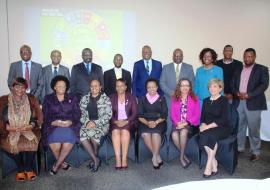 The consultants from AFRO posing for a group photo with the WHO Representative Dr Tigest Ketsela Mengestu, UNFPA Representative Ms Sharareh Armikhalili, Ministry of Health PS Dr Simon Zwane and other senior officers from the WCO and Ministry of Health during the high level meeting.