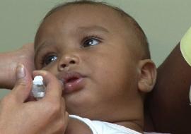 A child being vaccinated against rotavirus