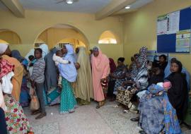 Women with eligible children queue up for routine immunization at health facility in Kaduna.