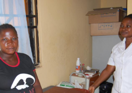 (Seated) Mrs Naomi Muyadeen and Head Nurse Esther Adepoju, Kuchigoro Primary Health Care Centre, Abuja.