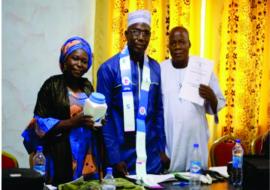 Rahab (left) with colleagues at a Schistosomiasis training.