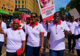   Ministry of Health Officials, Partners and the general public march through the city to create awareness 