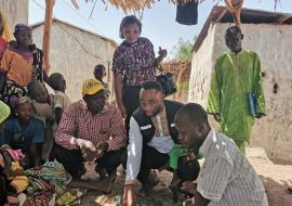 WHO team training community volunteers and health workers on the use of AVADAR in Gurai, South Sudan. 