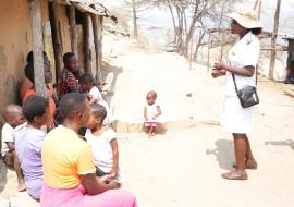 Health care worker explaining to women about post abortion care services available at health centres