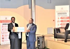 WHO Representative to Namibia, Dr Charles Sagoe-Moses handing over the COVID-19 medical supplies to the Minister of Health and Social Services, Dr Kalumbi Shangula 