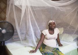 Pregnant woman and one of the beneficiaries of the LLIN distributed by WHO