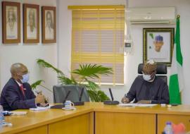 WR (Left) with the Honorable Minister of Federal Capital Territory Mohammed Musa Bello