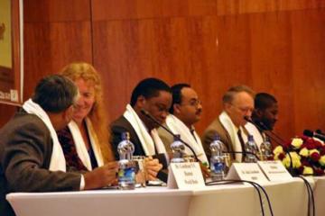 Dr Pierre M’pele Kilebou, WHO Representative to Ethiopia; H.E. Dr Kesetebirhan Admassu, Minister of Health with other delegates at the Symposium