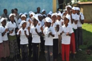 Children singing about the importance of vaccination at the launching of the 2nd AVW 2012, Keffa Zone, SNNPR