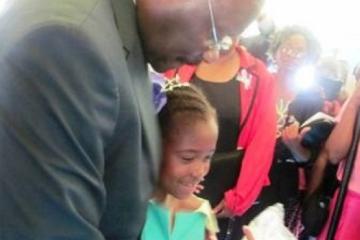 The first 10 year old girl to receive the HPV vaccine in Zimbabwe with Hon. Minister Parirenyatwa