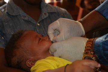 A child receiving Vitamin A supplementation during the campaign