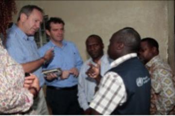 WHO Field Coordinator briefing the UN team in Kailahun.