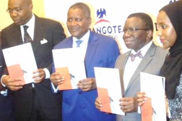 L-R Alhaji Aliko Dangote Professor Isaac Adewole and Halima Dangote during unveiling of the document