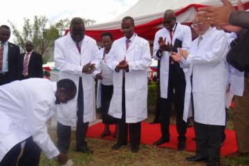 H.E. James Wani Igga laying the foundation stone