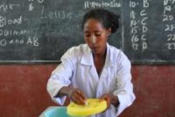 Health worker getting ready to vaccinate children in a school in Sabata town, Oromia region.