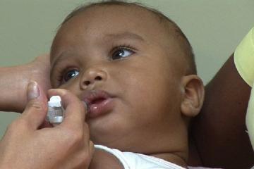 A child being vaccinated against rotavirus