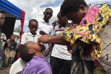 A child receives the vaccine on May 27, 2019