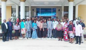 Permanent secretary (5th right) with members of NMTCC