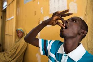 Man taking the NTD preventive tablet