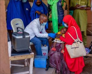 Eligible child being vaccinated