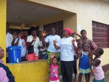 upils of Deaf and Dumb School showing sign of ‘I love you’ to Professor Davidson Munodawafa following a talk on keeping Ebola out of the community