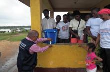 Prof.  Davison Munodawafa demonstrating hand-washing at the Deaf and Dumb School in Virginia, Montserrado