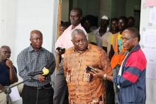 Pro. Monudawafa, WHO and Rev. Sumo, Ministry of Health greet each other at Island Hospital