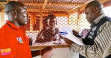 Liberia: Mr Tamba Alpha, surveillance officer, is inspecting isolation rooms at a Voinjama checkpoint with Mr Charles Ntege, WHO county coordinator. WHO/M. Winkler