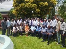 Delegates and review team posing for a group photo. Photo WHO